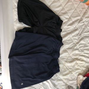 two pairs of champion shorts Size XL